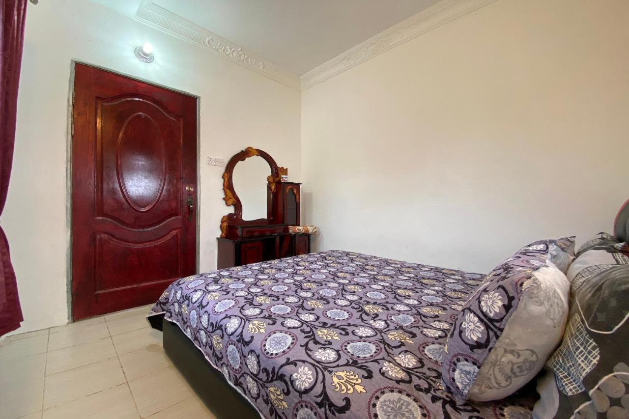 Oyo Home 90331 D'Jj Homestay 古打毛律 外观 照片